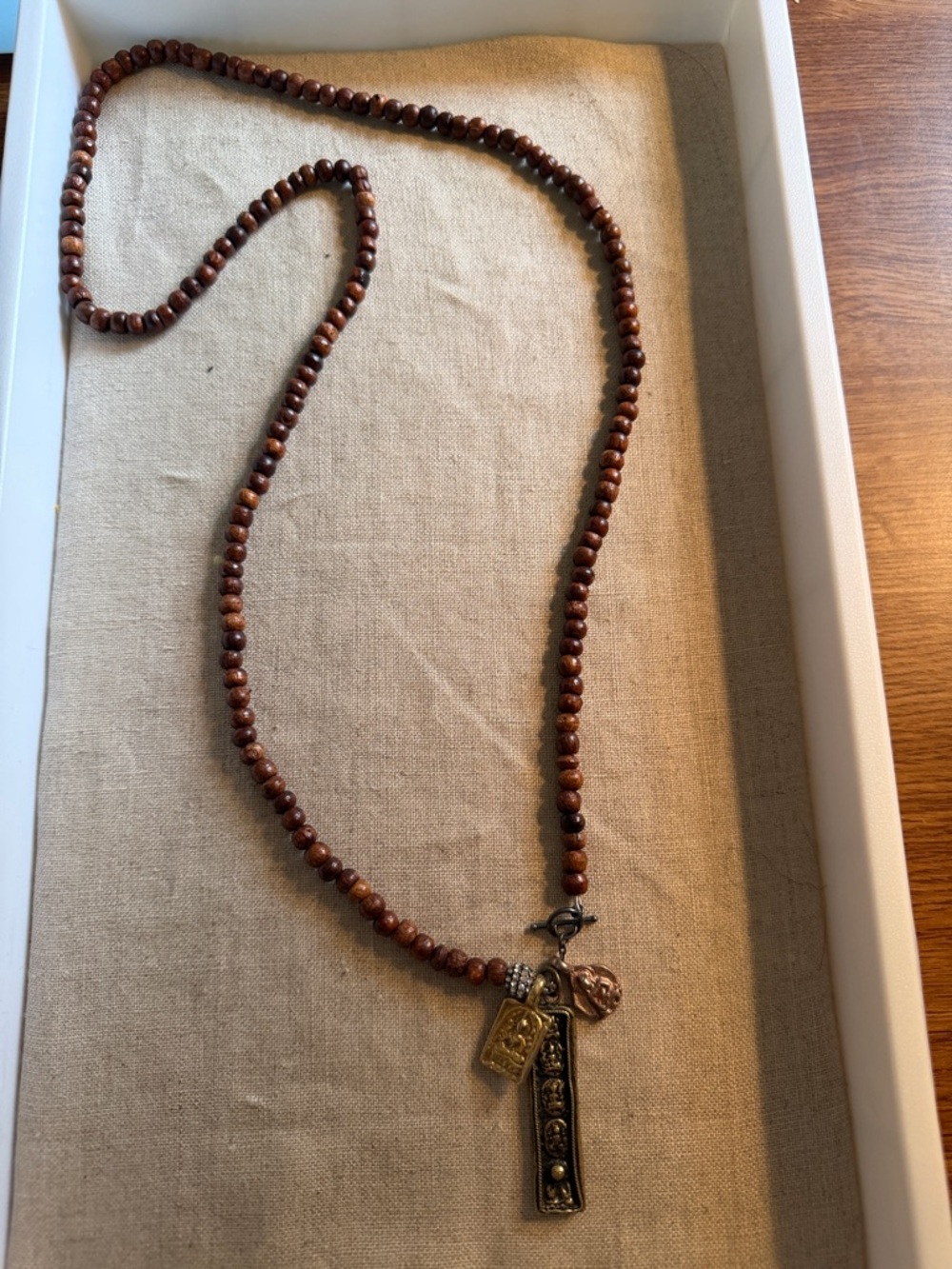 Stella & Dot Brown Beaded Pendant Necklace with Mixed Metal Charms
